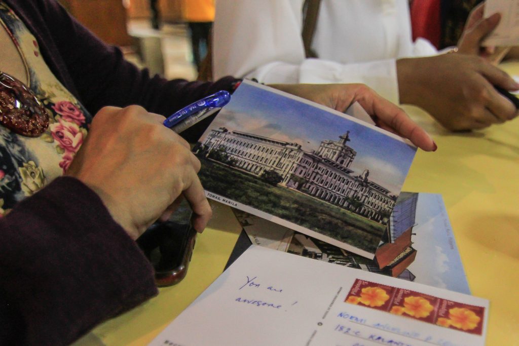 UST exhibits donated collection of vintage postcards, stamps, and books
