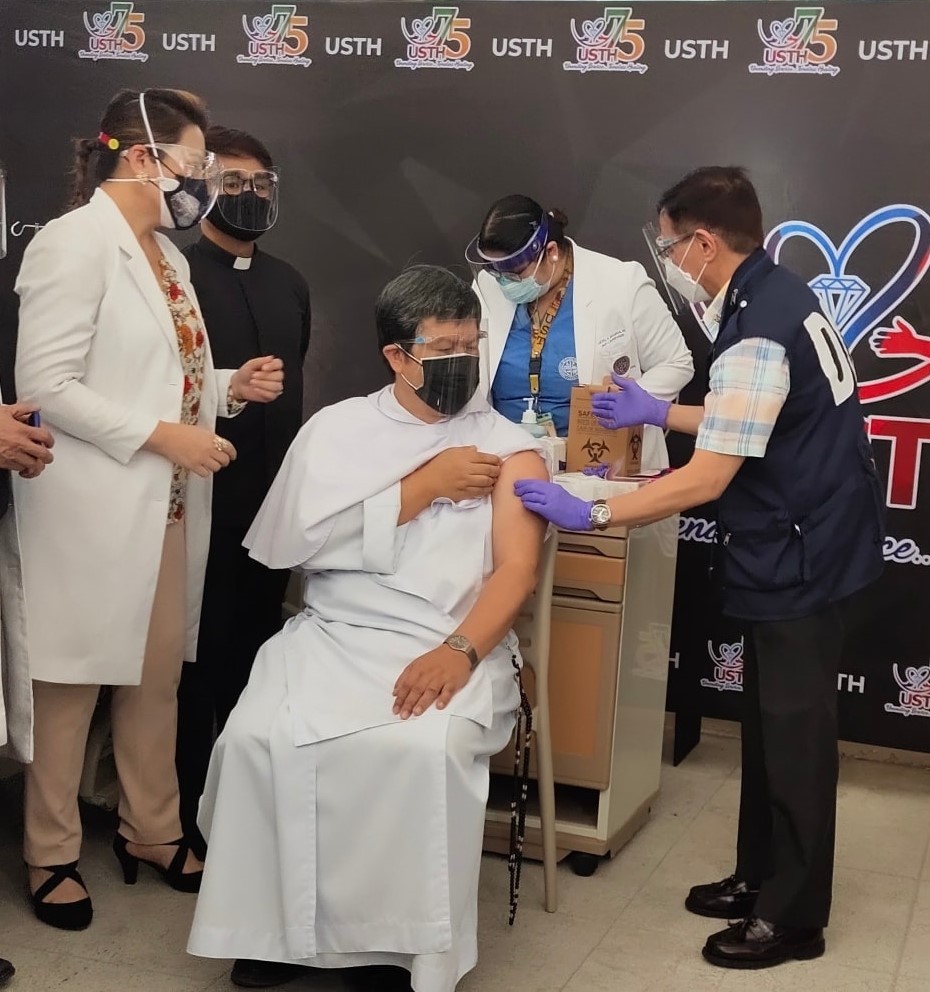 Health Secretary Duque visits UST Hospital’s ceremonial vaccination against COVID-19